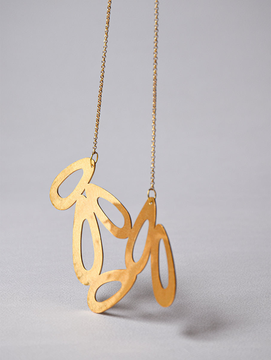 CLUSTER NECKPIECE